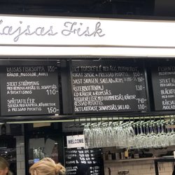 Kajsas Fisk - Menu, there's an English menu, but it's hidden by the line of people