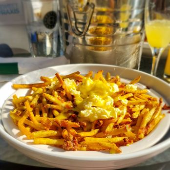The Evergreen - Brunch poutine on rosemary fries - American Near Me - Syracuse, New York The Evergreen - Brunch poutine on rosemary fries - American Near Me - Syracuse, New York