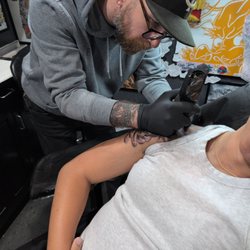 Two Coins Tattoo - Steve tattooing