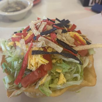 La Carreta Mexican Restaurant - That is a Taco salad with chicken, cheese, tomatoes and taco chip. - Mexican Near Me - Houston, Texas La Carreta Mexican Restaurant - That is a Taco salad with chicken, cheese, tomatoes and taco chip. - Mexican Near Me - Houston, Texas
