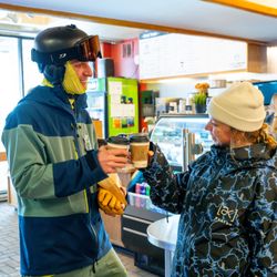 Baked & Brewed Café - Two skiers drinking coffee at Snowbird's Baked and Brewed