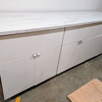 IKEA - Laminate top, white cabinet doors and handles - Furniture Stores Near Me - Costa Mesa, California IKEA - Laminate top, white cabinet doors and handles - Furniture Stores Near Me - Costa Mesa, California