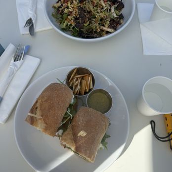 Pura Vida Miami - Chicken Pesto Sandwich (bottom) & THAI ALMOND Salad with Chicken (top) - Breakfast & Brunch Near Me - Malibu, California Pura Vida Miami - Chicken Pesto Sandwich (bottom) & THAI ALMOND Salad with Chicken (top) - Breakfast & Brunch Near Me - Malibu, California