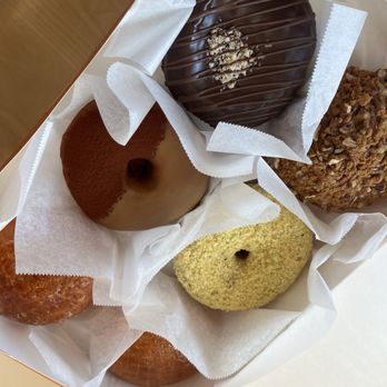 Old Ferry Donut - Up to down, starting on the left side; Hazelnut Choco, Tiramisu, Creme Brulee, Maple Pecan, Butter Pistachio, Creme Brulee - Donuts Near Me - San Gabriel, California Old Ferry Donut - Up to down, starting on the left side; Hazelnut Choco, Tiramisu, Creme Brulee, Maple Pecan, Butter Pistachio, Creme Brulee - Donuts Near Me - San Gabriel, California