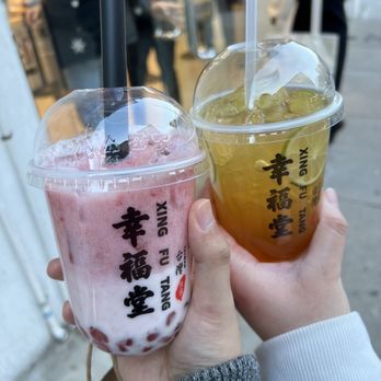 Xing Fu Tang - Strawberry Boba Milk (left) Jasmine Tea with Honeycomb (right) - Bubble Tea Near Me - New York, New York Xing Fu Tang - Strawberry Boba Milk (left) Jasmine Tea with Honeycomb (right) - Bubble Tea Near Me - New York, New York