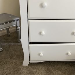My daughters nursery changing station broken draw not even put together well. My daughters nursery changing station broken draw not even put together well.