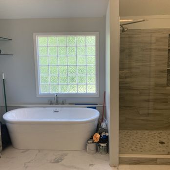 360 Design and Remodel - a bathtub and shower - TV Mounting Near Me - Shawnee, Kansas 360 Design and Remodel - a bathtub and shower - TV Mounting Near Me - Shawnee, Kansas