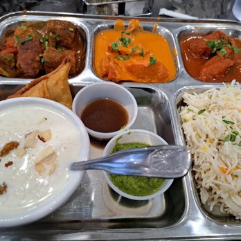 IndianBistro14 - Non Veg Thali, contains the 3 curries of the day, rice, rice pudding desert, an amazing fried samosa pie and the best green sauce!! - Indian Near Me - Arlington, Texas