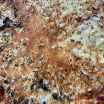 Barro's Pizza - A grease pot in the center of the pizza. - Pizza Near Me - Phoenix, Arizona Barro's Pizza - A grease pot in the center of the pizza. - Pizza Near Me - Phoenix, Arizona