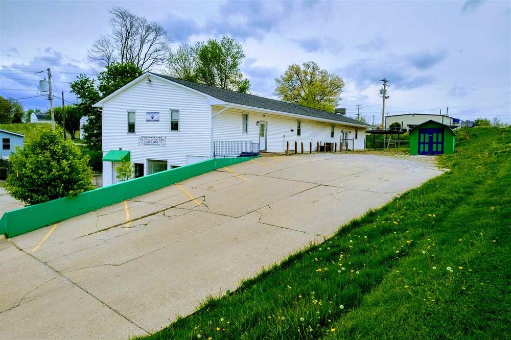 MELTON REAL ESTATE Updated October 2024 29 Photos 115 N Main St