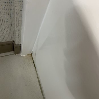 Holiday Inn Express Irwin - Dirty corner in bathroom near the tub (we were literally in the room for 10 hours or less and it was like this when we got there.) - Hotels Near Me - North Huntingdon, Pennsylvania
