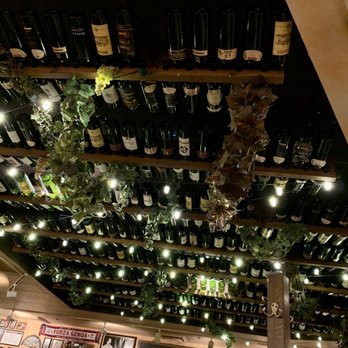 Buca di Beppo Italian Restaurant - Ceiling of wine bottles - Italian Near Me - Universal City, California