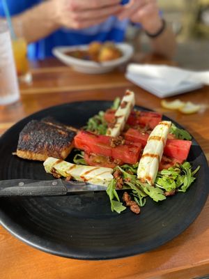 Photo of Caps On The Water - St Augustine, FL, US. Halloumi salad added salmon