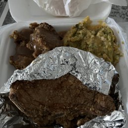 Fried pork chops, broccoli casserole, and cornbread Dressing with Gravy