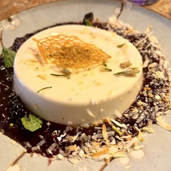 Osteria Vivo - Coconut panna cotta with berry coulis - Italian Near Me - Pembroke, Massachusetts Osteria Vivo - Coconut panna cotta with berry coulis - Italian Near Me - Pembroke, Massachusetts