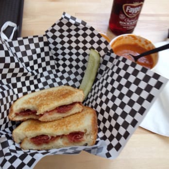 Black Sheep GCB - Manchego cheese with Serrano ham and quince paste, tomato soup has nice kick. Drinking rock & rye which is like cherry dr pepper - Sandwiches Near Me - Anaheim, California