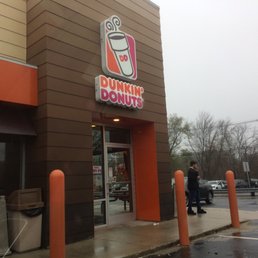 the entrance to a dunkin donut shop the entrance to a dunkin donut shop