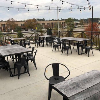 Flying Machine Brewing Company - Upstairs balcony. - Breweries Near Me - Wilmington, North Carolina Flying Machine Brewing Company - Upstairs balcony. - Breweries Near Me - Wilmington, North Carolina