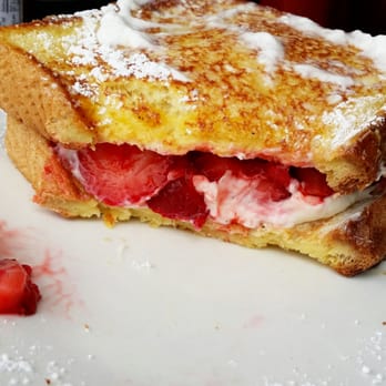 Orange Cafe Bistro - strawberry stuffed pancake (a la cartè or combo with a side of eggs and bacon or sausage) - Breakfast & Brunch Near Me - Orange, California