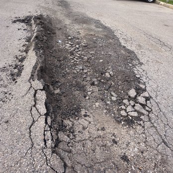 Cornerstone Management - This driveway has been like this for months, they don't care. - Property Management Near Me - Edmonton, Alberta Cornerstone Management - This driveway has been like this for months, they don't care. - Property Management Near Me - Edmonton, Alberta
