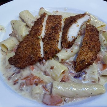 Johnny Carino's - Chicken Parmesan Rigatoni Festival - Italian Near Me - Fairfield, California Johnny Carino's - Chicken Parmesan Rigatoni Festival - Italian Near Me - Fairfield, California