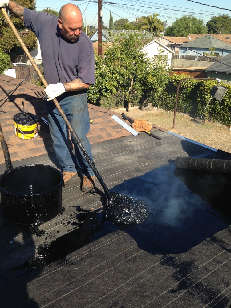 Slide of Hector's Roofing