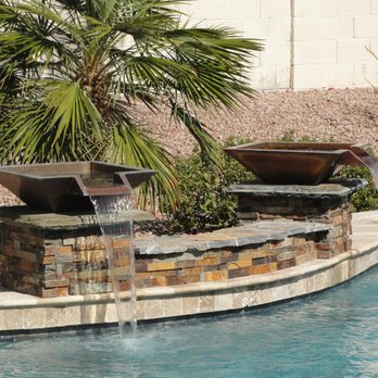 Prado & Sons Pool Plastering - Home owner wanted a modern water feature. Done. - Pool & Hot Tub Service Near Me - Glendale, Arizona