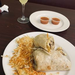 Our Los Altos Breakfast Burrito with salsa and crispy hash browns. Our Los Altos Breakfast Burrito with salsa and crispy hash browns.