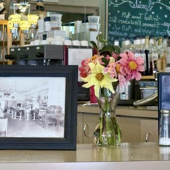 Little Village Cafe - Decor with picture of original cafe - Cafes Near Me - Baraboo, Wisconsin