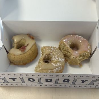 Parlor Doughnuts - Maple bacon, French toast, strawberry frosted. Topping were delicious, GF doughnuts were gross. - Donuts Near Me - St. Augustine, Florida