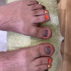 Unwind Nail Lounge - This is my Halloween themed toe-nail set. Very pleased.