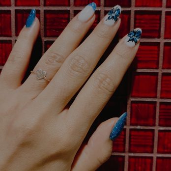 Red Polish - Blue glitter nails with butterflies - Nail Salons Near Me - Los Angeles, California Red Polish - Blue glitter nails with butterflies - Nail Salons Near Me - Los Angeles, California