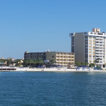 Holiday Inn - The short building is this hotel, great view from our fishing boat! - Hotels Near Me - Clearwater Beach, Florida Holiday Inn - The short building is this hotel, great view from our fishing boat! - Hotels Near Me - Clearwater Beach, Florida