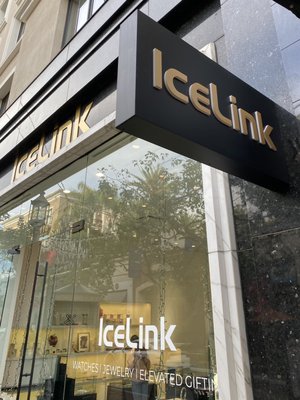 IceLink - When IceLink moved in to the Americana in Glendale, we helped produce and install all the signage including the polished gold aluminum store front letters, the illuminated blade sign and vinyl decals inside and outside the store.