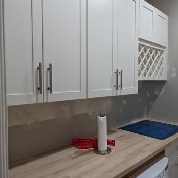 Silva Interior Renovations - a washer and dryer in a laundry room - Countertop Installation Near Me - Sarasota, Florida Silva Interior Renovations - a washer and dryer in a laundry room - Countertop Installation Near Me - Sarasota, Florida