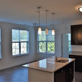 Burgess Mill Station - Gorgeous kitchen island and living area with tons of natural light! - Apartments Near Me - Ellicott City, Maryland Burgess Mill Station - Gorgeous kitchen island and living area with tons of natural light! - Apartments Near Me - Ellicott City, Maryland