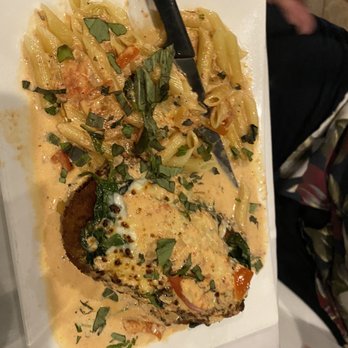 Eurasia - a plate of pasta with meat and vegetables - Asian Fusion Near Me - Naples, Florida Eurasia - a plate of pasta with meat and vegetables - Asian Fusion Near Me - Naples, Florida