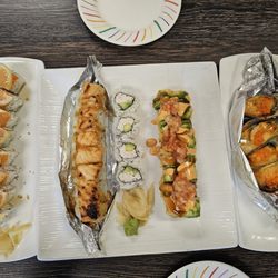 Fuji Sushi - 2 for $34 from right to left (baked mussels app, sunset roll, cali roll and lion king roll. Added on smokey joe)