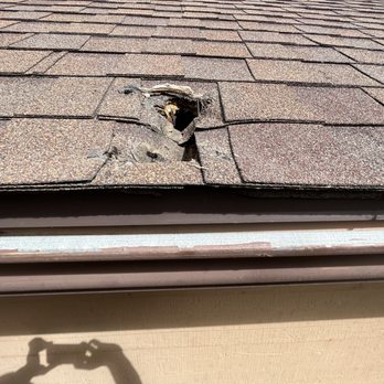 Aspen Roofing - Hole caused by satellite dish. - Roofing Near Me - Colorado Springs, Colorado Aspen Roofing - Hole caused by satellite dish. - Roofing Near Me - Colorado Springs, Colorado