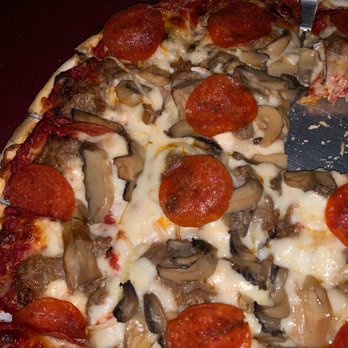 Sturino’s - a pizza with pepperoni and mushrooms - Italian Near Me - Kenosha, Wisconsin Sturino’s - a pizza with pepperoni and mushrooms - Italian Near Me - Kenosha, Wisconsin