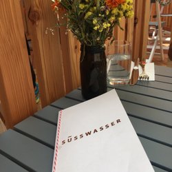 Süsswasser - Menu, flowers on the deck