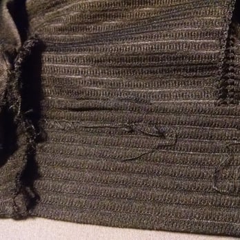 NE Tailor Shop - Another section of the unraveled hemline Altug would not bother looking at or fixing. - Sewing & Alterations Near Me - Minneapolis, Minnesota NE Tailor Shop - Another section of the unraveled hemline Altug would not bother looking at or fixing. - Sewing & Alterations Near Me - Minneapolis, Minnesota