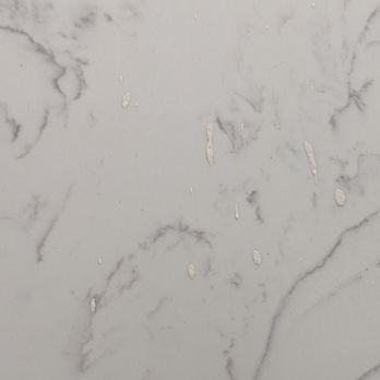 Electric Heroes - splatter on the shower wall after the fixit work was done. according to the owner, this is "dust" - Electricians Near Me