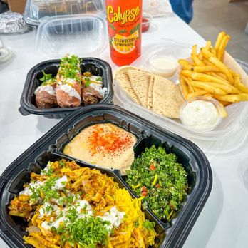 Shawarma Guys - Chicken Shawarma Plate, fries, Chicken Shawarma Egg Rolls (2pcs), calypso lemonade - Middle Eastern Near Me - La Mesa, California Shawarma Guys - Chicken Shawarma Plate, fries, Chicken Shawarma Egg Rolls (2pcs), calypso lemonade - Middle Eastern Near Me - La Mesa, California