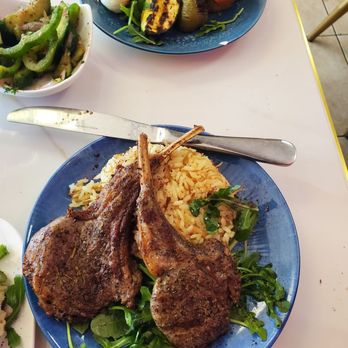 Dvine Mediterranean Experience - Long Beach - Lamb chops: three come to a plate, the other was in my hand. - Mediterranean Near Me - Long Beach, California