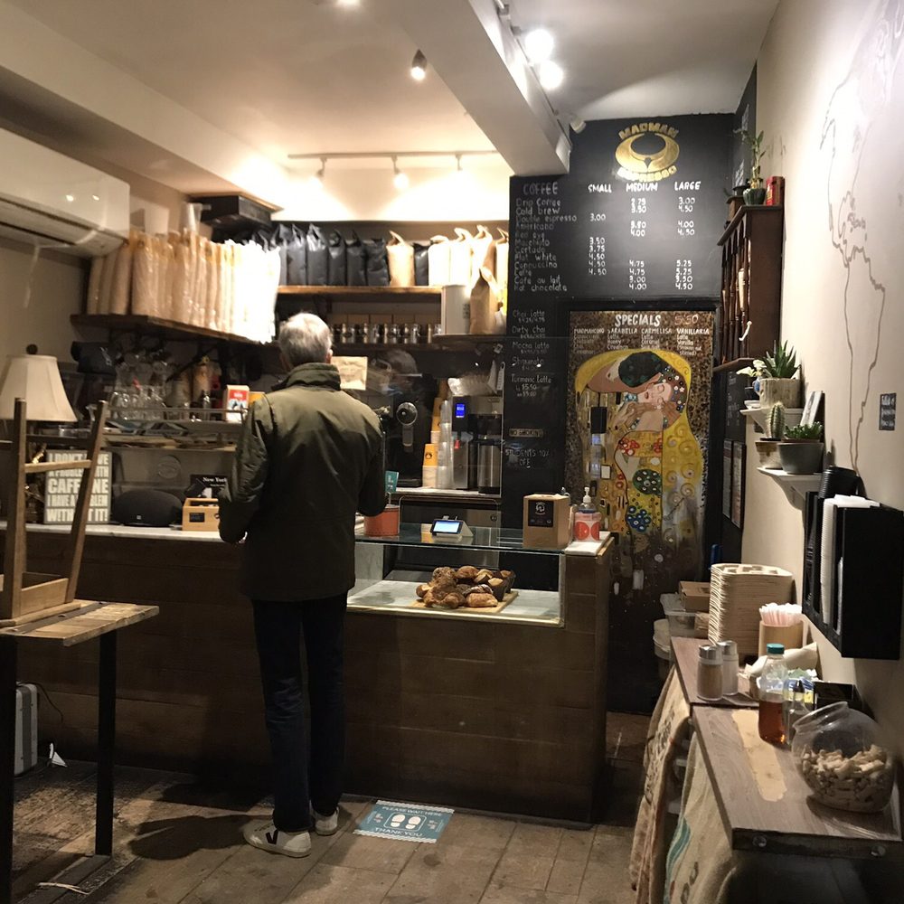 Madman Espresso - a man standing in a coffee shop - Coffee & Tea Near Me - New York, New York