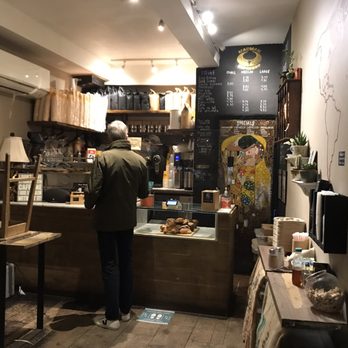 Madman Espresso - a man standing in a coffee shop - Coffee & Tea Near Me - New York, New York