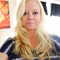 Halo Salon & Spa - I came in with white, pinkish- orange hair and left feeling great!  Color correction genius!