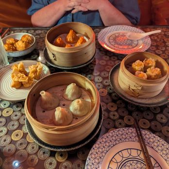 Mott 32 - From top to bottom: shrimp toast, hot & sour Xiao Long Bao, crab & cheese wontons, crab Roe Sui Mai, and traditional pork Xiao Long Bao - Chinese Near Me - Las Vegas, Nevada Mott 32 - From top to bottom: shrimp toast, hot & sour Xiao Long Bao, crab & cheese wontons, crab Roe Sui Mai, and traditional pork Xiao Long Bao - Chinese Near Me - Las Vegas, Nevada