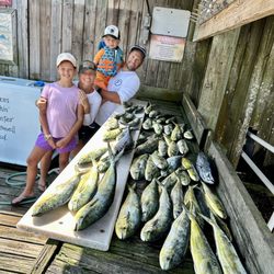 Panhandle Charters and Guide Service - Very happy family! Taking Mahi home to Indiana!